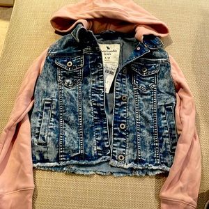 Brand new Abercrombie kids cute jean jacket with pink hood and sleeves.